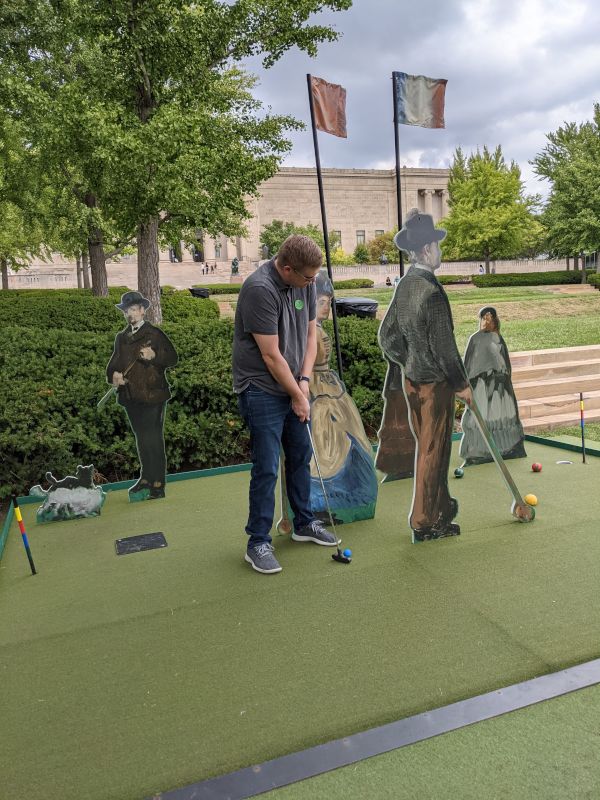 Matt Enjoying Mini-Golf at the Art Museum