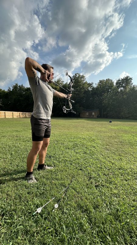 Relaxing After Work By Shooting Some Arrows in the Yard