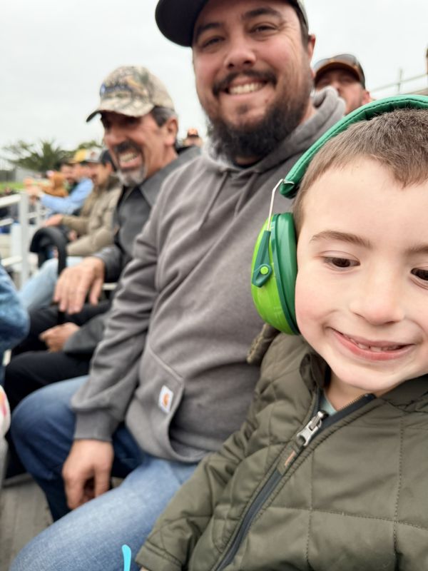 Vinny, Jason, and Grandpa at Monster Trucks