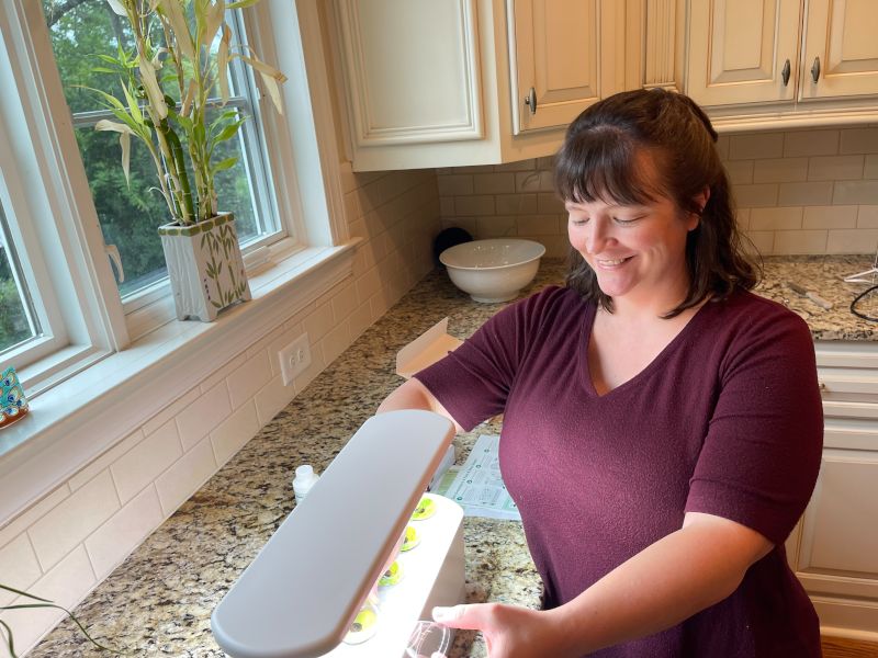 Melissa Working on Her Indoor Herb Garden