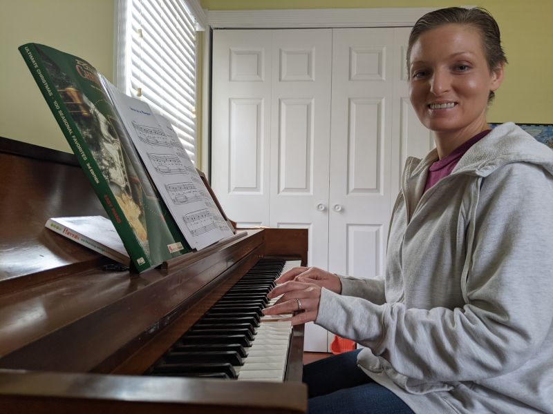 Terri Practicing Christmas Songs on the Piano