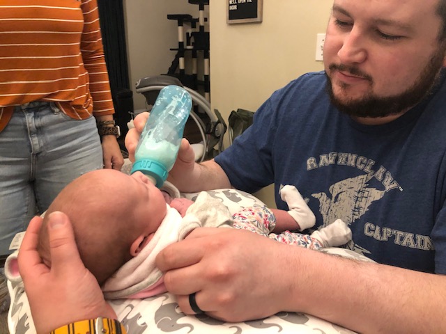 Josh Feeding Our Dear Friends' Baby