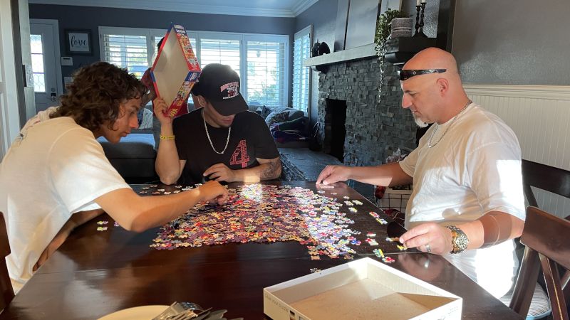 Adam & Nephews Completing a Puzzle